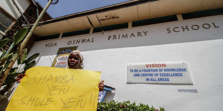 Dilemma For 2,500 Learners As Visa Oshwal Primary School Faces Eviction Staff At Oshwal Primary School Holding A Placard In 2022