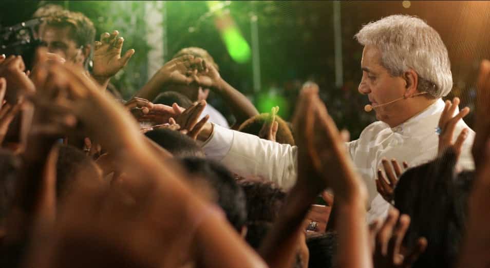 Benny Hinn Greets A Crow In One Of His Crusades. 