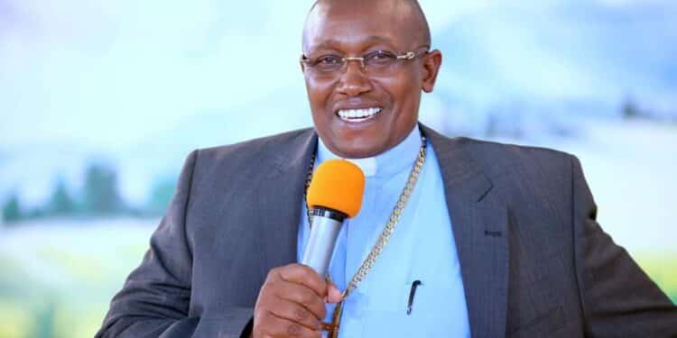 A Past Photo Of David Ngari Preaching In His Church. 