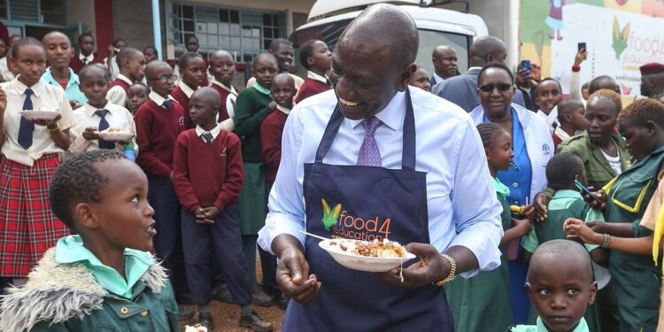 President Ruto Sharing A Meal With Pupils At A Primary School.