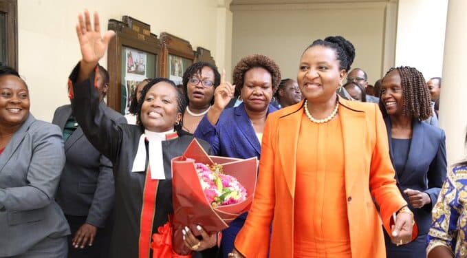 Crj Winfridah Mokaya Celebrates With Immediate Former Crj Anne Amadi Shortly After Being Sworn In As The New Chief Registrar Of The Judiciary.