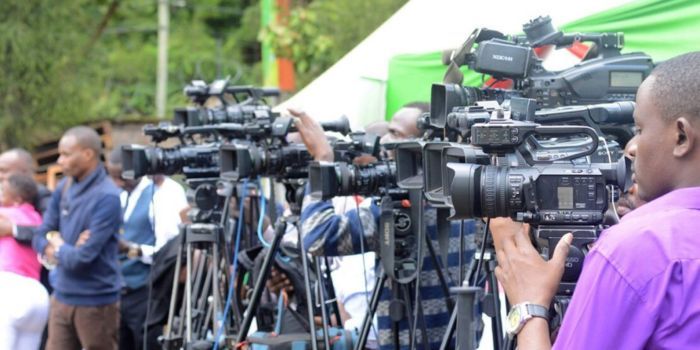 Journalists. A Group Of Journalists At A Past Press Briefing. A Group Of Journalists At A Past Press Briefing.