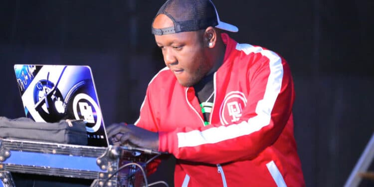 Dj Joe Mfalme On Decks Entertaining The Crowd During The Guinness Fanzone Experience In Meru. [Photo: David Gichuhi]