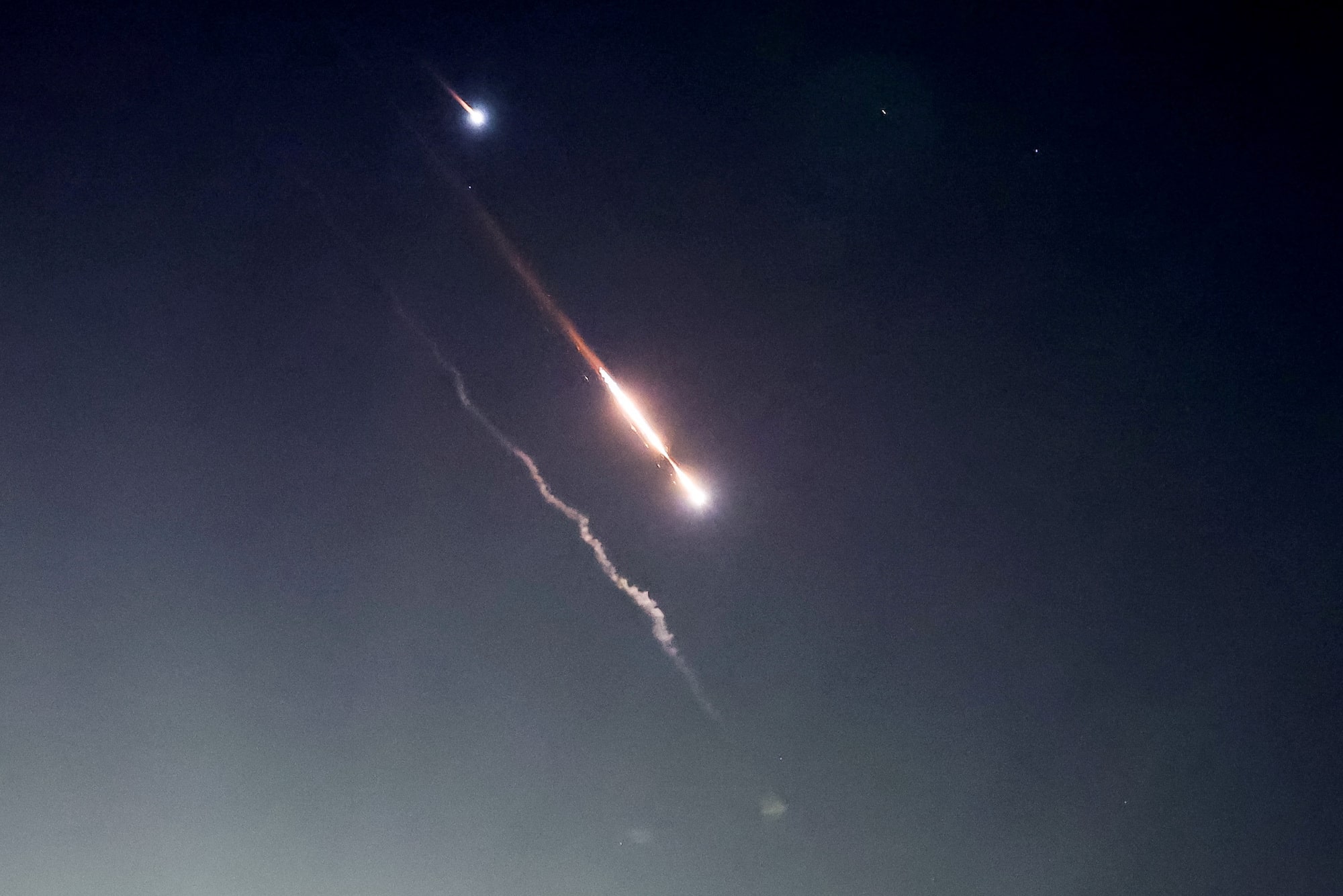 Intercepted Iranian Weapons Are Seen In The Sky In Jerusalem On Sunday. Photo/Reuters