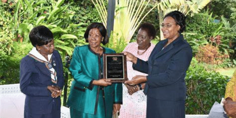 Former Cabinet Minister Nyiva Mwendwa Receives An Award From Gender Cs Margaret Kobia As Former Senator Zipporah Kittony Looks On In Gigiri On February 25, 2022. Photo/ Courtesy