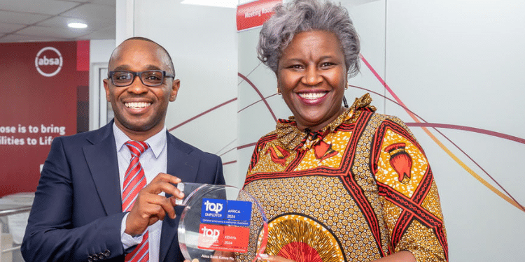 Absa Bank Kenya’s Chief People Officer Mumbi Kahindo With Samuel Ngotho.