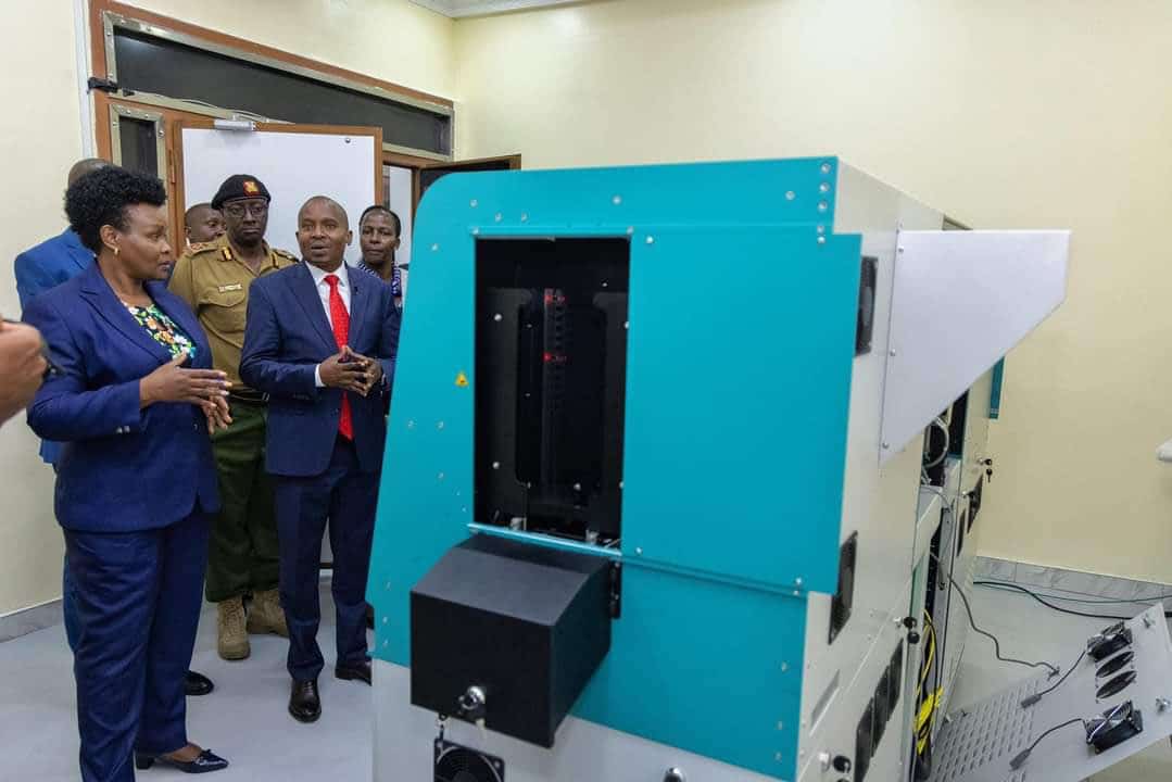 Interior Cs Kithure Kindiki Inspects A New Passport Printing Machine.