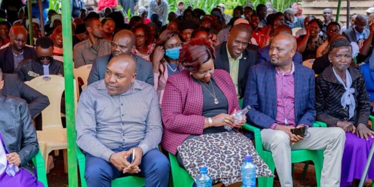 Mama Mboga Who Campaigned For Ruto To Enjoy Fruits Of Her Labour After Son'S Death Public Service Cabinet Secretary Moses Kuria (Right) And Kiambu Women Representative Ann Wamuratha Attend A Burial Ceremony In Githunguri Kiambu County On April 3, 2024.