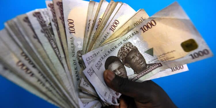 Nigerian Tycoon Dragged To Court For Splashing Money At An Event Naira Banknotes. Photo/Courtesy