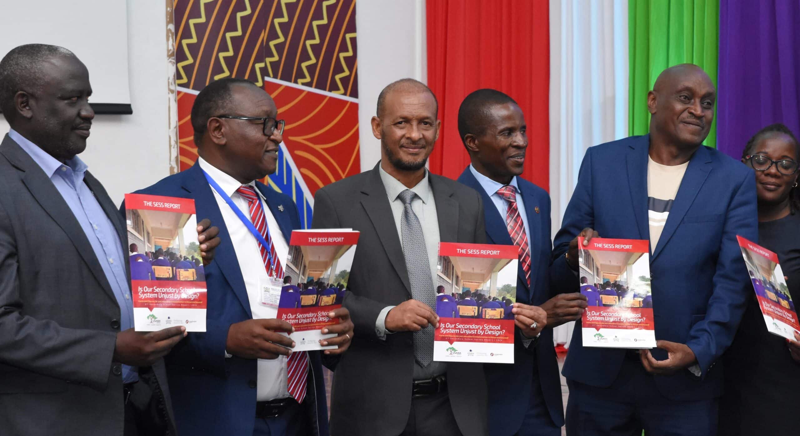 Dr. Moses Kiarie (Centre) From The Deputy Director Quality Assurance, Ministry Of Education, With Mandera South Mp Abdul Haro (Right) Launches The Usawa Agenda Sess 2024 Report) At Kicd, Nairobi, On Wednesday April 24, 2024.