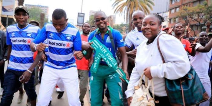Afc Fans Wearing Betsafe Branded Shirts