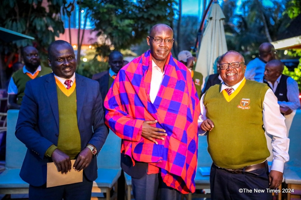 Oscar Kimanuka (C) And Kabarnet Highschool Alumni. Photo/ The New Times