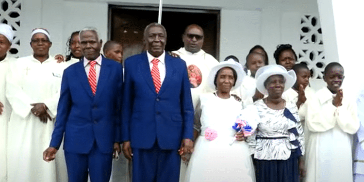 Polygamous Man Weds First Wife In Church As 2Nd Wife Watched A Group Photo With The Clergy. Photo/ Screen Grab