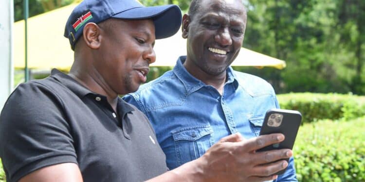 President Williame Ruto Shares Light Moments With National Assembly Majority Leader Kimani Ichung’wah. Photo/Pcs.