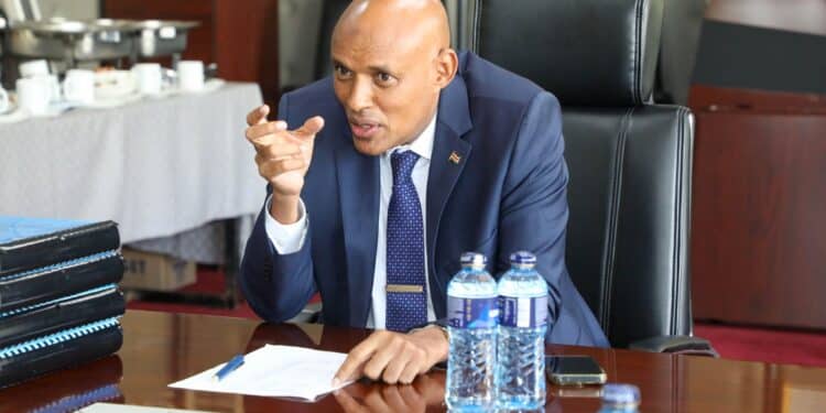 Good Conduct Certificates: Police Clearance To Take 24Hrs In New System A Photo Collage Of Interior Cs Kithure Kindiki And A Sample Of A Police Clearance Certificate. Photo/Courtesy.