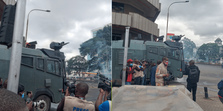 Photos Of A Police Water Cannon Dispersing Anti-Finance Bill Protesters In Nairobi Cbd On June 20,2024.Photo The Kenya Times.