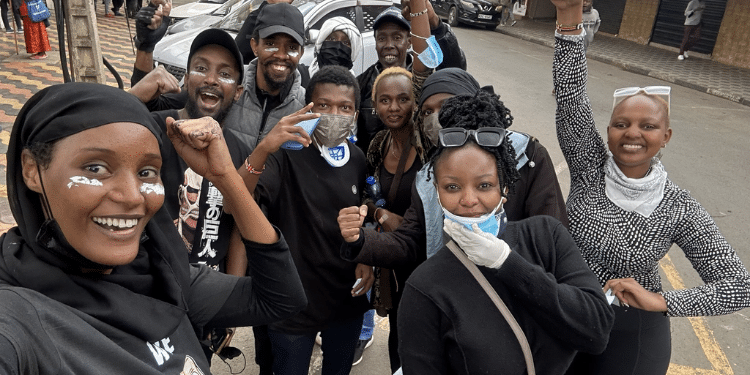 Hanifa Farsafi With Protestors At Nairobi. Photo/Tkt