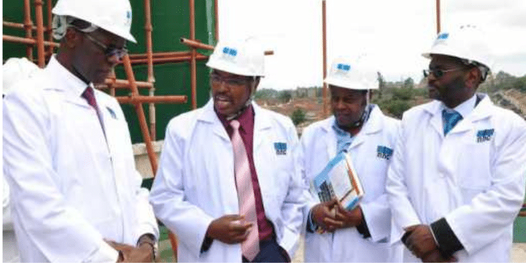 Francis Gitau (Left) When He Was The Nhc Chairman Being Briefed On The New Housing Projects. Photo/ Courtesy
