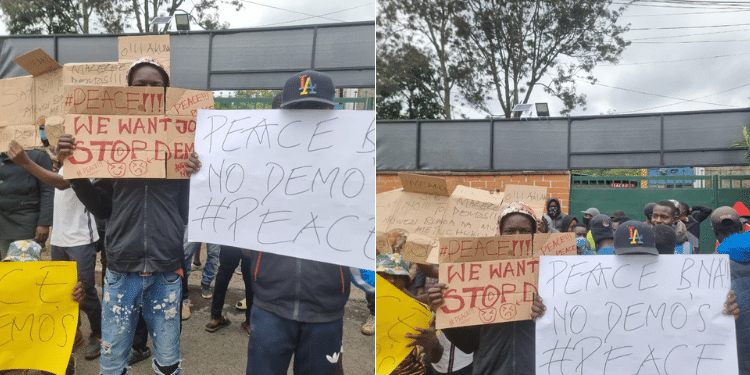 A Group Youth Carrying Placards Outside Boniface Mwangi'S Office. Photo/ Courtesy