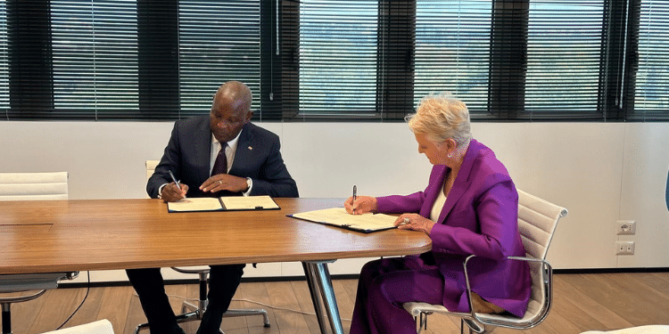 World Food Programme (Wfp) Executive Director, Cindy Mccain And Equity Group Managing Director And Ceo, Dr. James Mwangi Signing An Agreement To Enable Small Scale Farmers To Grow And Thrive. Photo/Hand Out