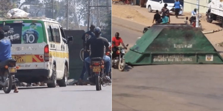 A Screengrab Of Of A Vehicle Stopped Along Homabay Rongo Road And Garbage Collector Tanks Barricaded On The Road. Photo/ Screen Grab