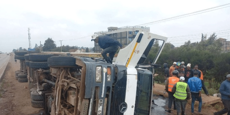 Members Of The Public Gather At The Scene Where A Trailer Carrying Sodium Cyanide Overturned On July 20, 2024. Photo/Courtesy