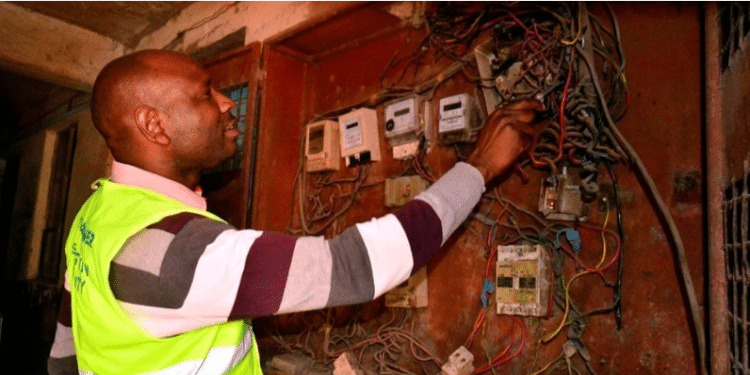 A Kenya Power Employee Inspects A Meter Box At An Apartment Building In Tassia Estate, Nairobi In February 2020. Photo/ Nation