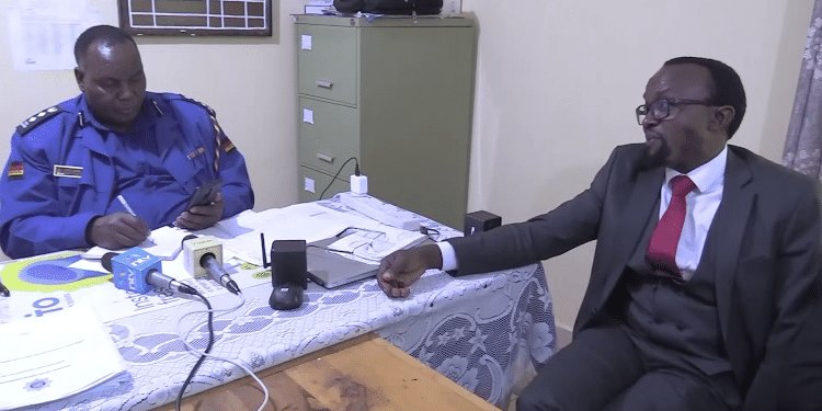 Lawyer Ndegwa Njiru With Mathioya Sub County Police Commander Paul Karobia At Kiria-Ini Police Station. Machiriimage: Alice Waithera