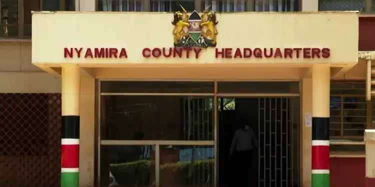 Nyamira Governor Amos Nyaribo With Other Officials Outside The County Headquarters.  Photo/ Nyamira County Website.