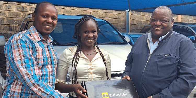 Turaco, Autocheck Seal Deal To Make Car Insurance More Accessible Image Of Autocheck Team With Customer. Photo/X