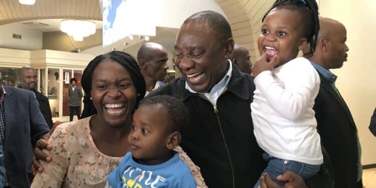 South Africa’s President Cyril Ramaphosa Carrying A Child In 2018. Photo/Anc Party.