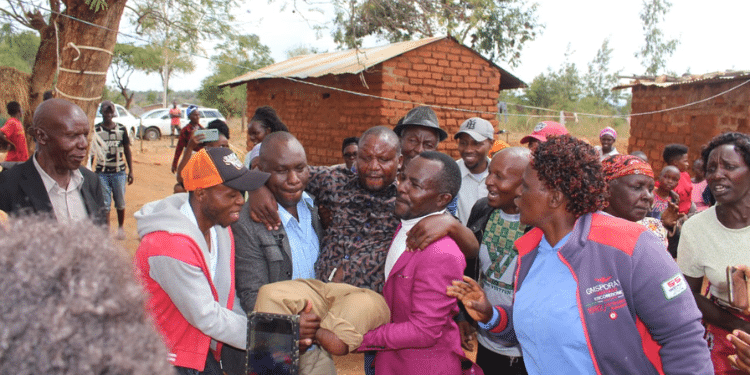 Benard Carried By The Family While Rejoicing And Dancing. Photo/Knh