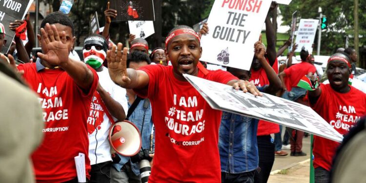 Aoko Goes Missing For 4 Days Boniface Mwangi At A Past Demonstration With Other Activists In Nairobi. Photo/Screengrab