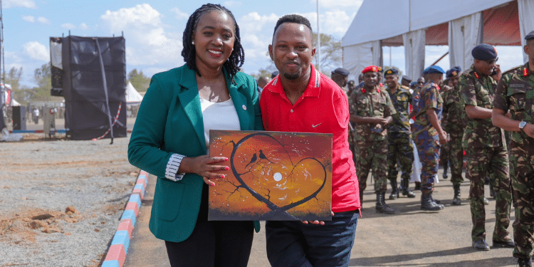 Sammy Brayo A Differently Abled Gospel Musician, Motivational Speaker, Portrait Artist And Lg Nanotv Influencer With Cs Soipan Tuya. Photo/Tuya