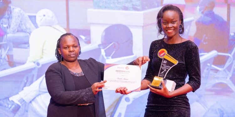 Brenda Kerubo Receives Ict &Amp; Telecommunications Reporting Category-Tv At The 2022 Annual Journalism Excellence Awards (Ajea). Photo/ Kerubo
