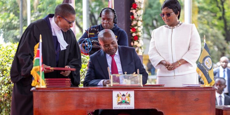 In Pictures: Moments Captured During Kindiki Swearing In Deputy President Kithure Kindiki Signs Oath Documents After His Swearing In. Photo/Tkt