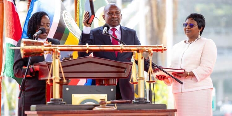 In Pictures: Moments Captured During Kindiki Swearing In Deputy President Kithure Kindiki Taking Oath Beside His Wife Joyce Kindiki. Photo/The Kenya Times