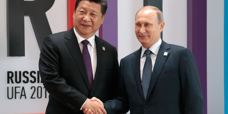 China, Russia Oppose Kenya-Led Haiti Mission Russian President Vladimir Putin Shakes Hands With Chinese President Xi Jinping At A Summit In Ufa, Russia. (Photo By Ivan Sekretarev / Ap Photo)