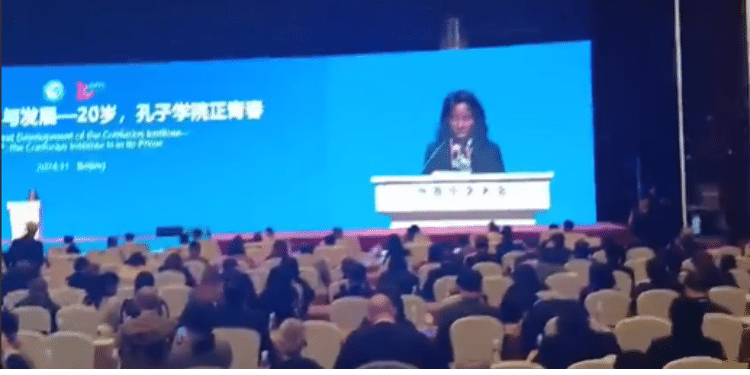 The Principal Secretary, Of The State Department For Higher Education And Research, Ministry Of Education, Kenya Beatrice Muganda Inyangala While Delivering Her Speech. Photo: Screengrab/Inyangala X Account