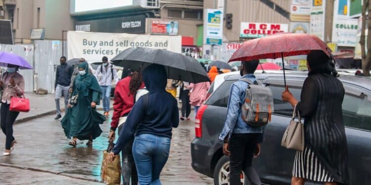 Nairobi City Dwellers During A Rainy Day. Photo/Wilfred Nyangaresi X
