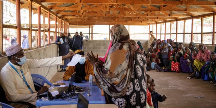 Omali Refugees Talk With United Nations High Commissioner For Refugees (Unhcr) Staff At The Resigtration Centre In The Dadaab Refugee Camp On March 23, 2023