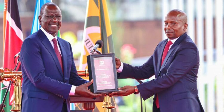 President William Ruto Handing Dp Kithure Kindiki The Constiturtion Photo/ Kindiki