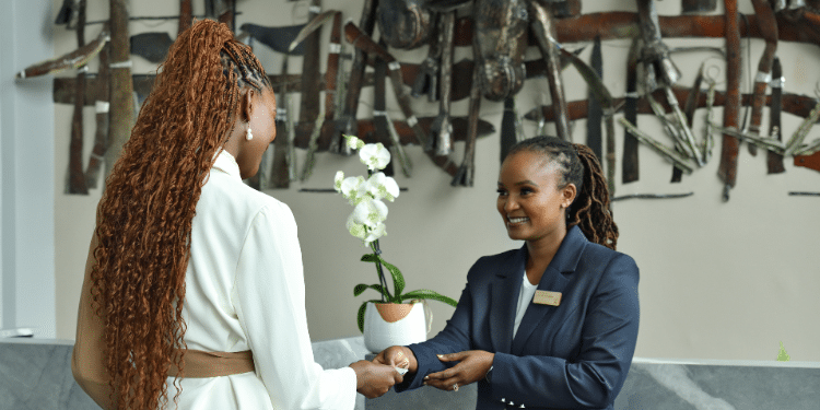 African Elegance: Why Novotel Nairobi Westlands Is The Perfect Find For Business, Leisure &Amp; Family Travelers A Receptionsist Welcoming A Guest At The Novotel Hotel In Nairobi. Photo/ Novotel