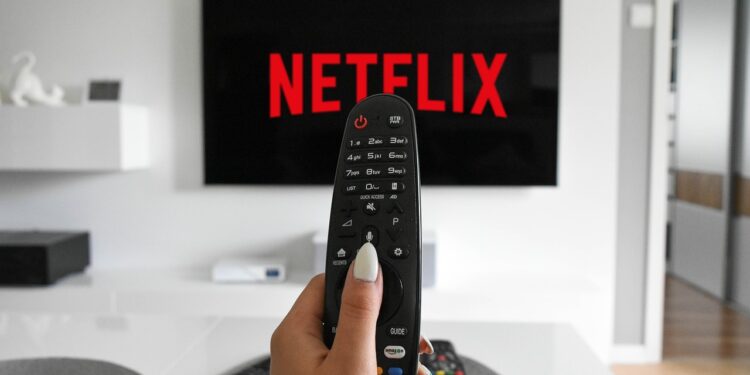 A Hand Holding A Tv Remote. A Hand Holding A Tv Remote. A Hand Holding A Tv Remote. A Hand Holding A Tv Remote. 