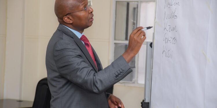 Peter Mbae After He Assumed Office As The Head Of Government Delivery Services In June 11, 2204. Photo/ Mbae Fb.
