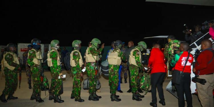 Raymond Omollo Poses For A Photo With Kenyan Police Officers Before They Left For Haiti On January 18, 2024, At Jkia. Photo/Omollo X.