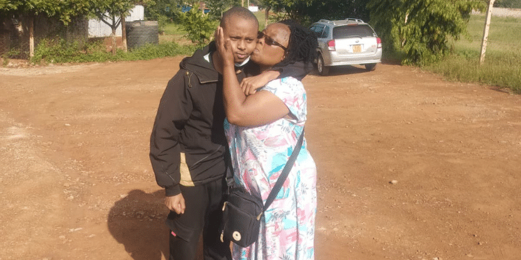 Billy Mwangi With His Mother After He Was Released