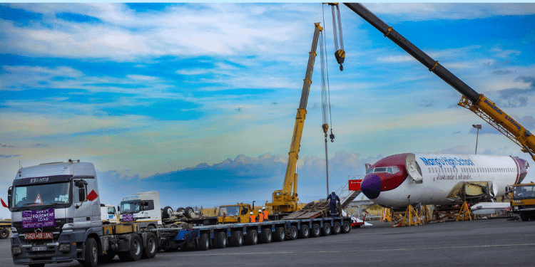 Boeing 737-700 Aircraft Being Loaded Onto A Truck For Transportation To Mang'U High School. Photo/Kenya Airways