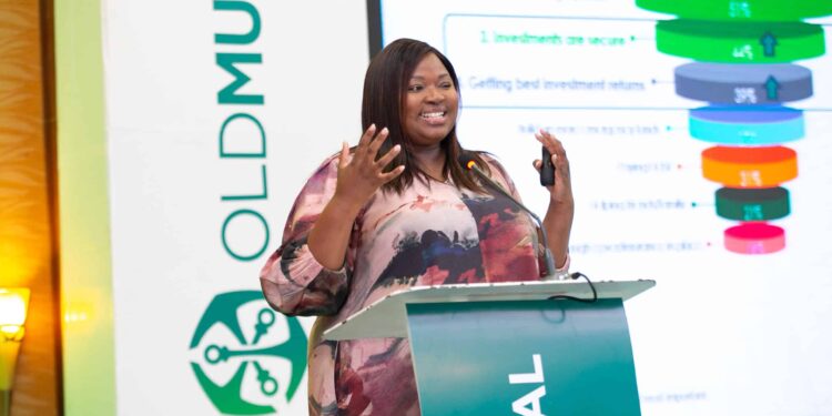 Old Mutual Kenya Official During The Presentation Of The Survey Report. Photo/ Old Mutual Save Money