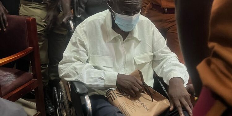Kizza Besigye Ends Hunger Strikes After Being Charged With Treason Kizza Besigye Appearing Before Courts On A Wheelchair. Photo/ Winnie Byanyima